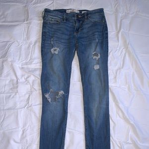 ripped hollister low rise skinny jeans